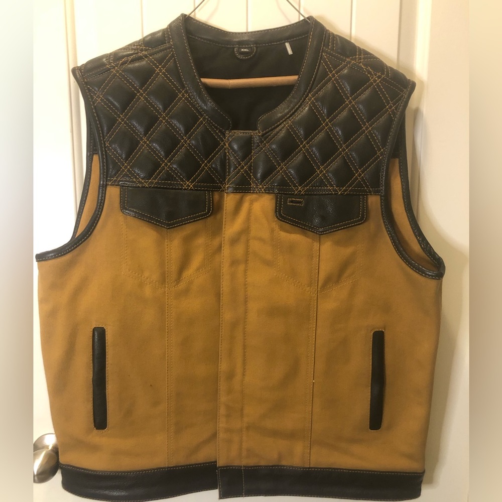 First mfg leather and canvas vest